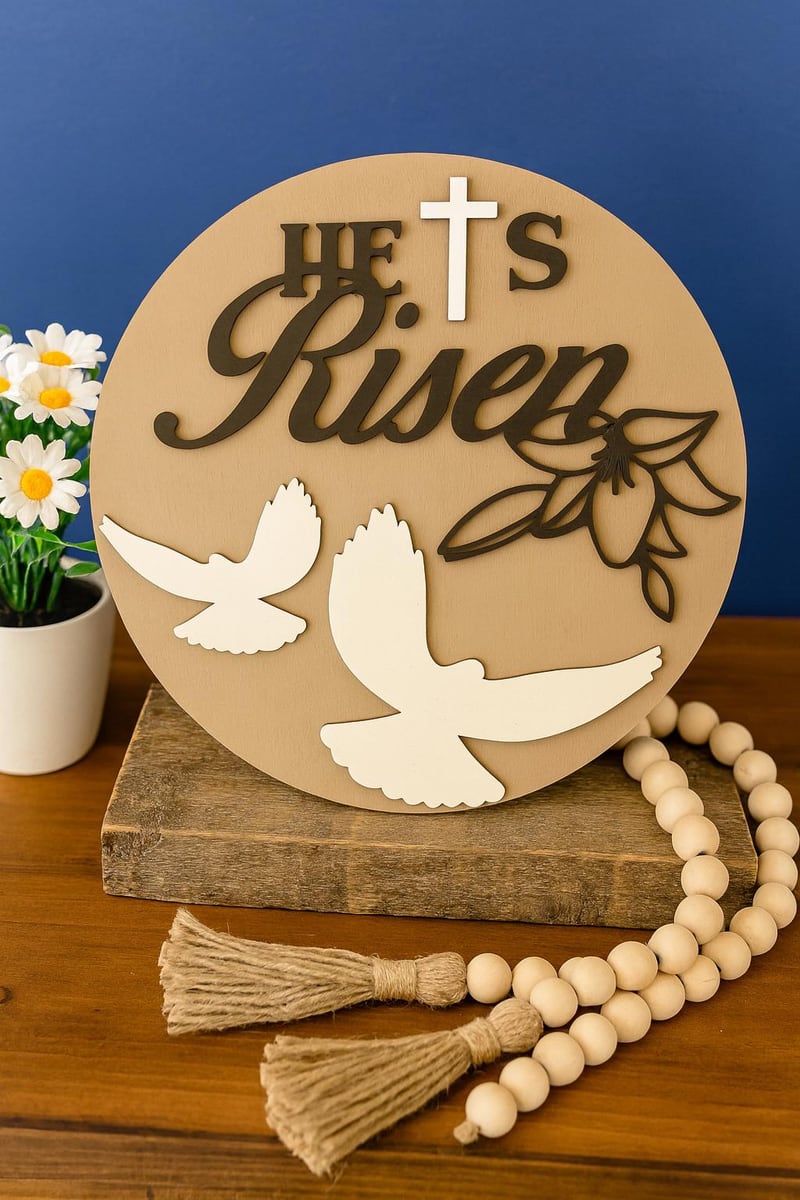 He Is Risen sign with doves and leafy branches, shown in a styled setting